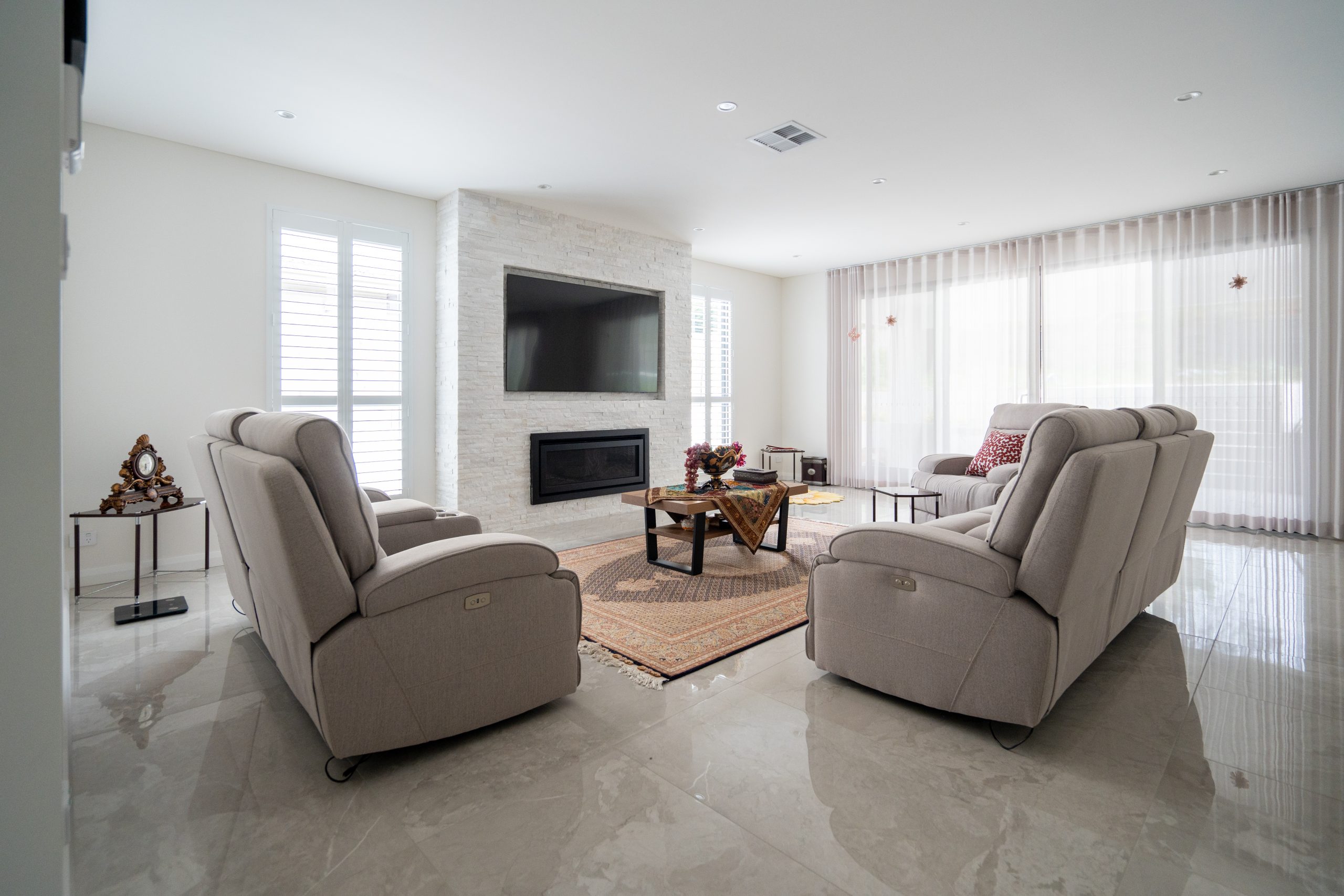 Modern Minimalist Living Room with Recliner Sofas